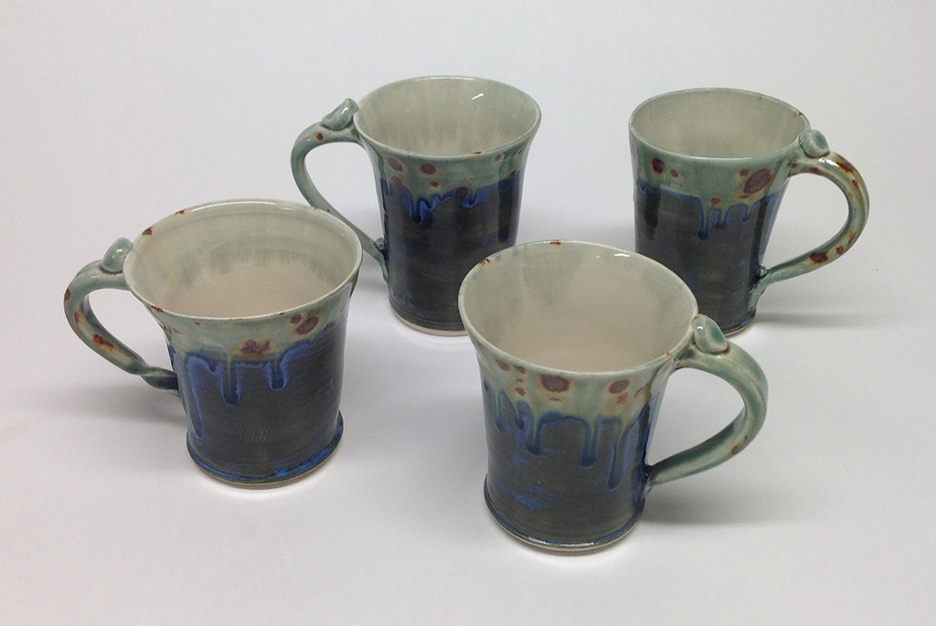 Four Blue Cups